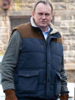 After The Flood 2024 Philip Glenister Blue Puffer Vest