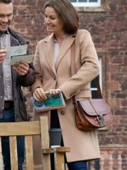Lily TV-Movie A Scottish Love Scheme 2024 Erica Durance Brown Coat