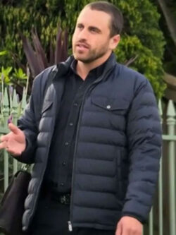 Lloyd Will Neighbours 2025 Andrew Rodwell Blue Puffer Jacket
